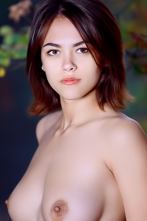Dzhili Offering An Uninhibited Display Of Her Perky Breasts