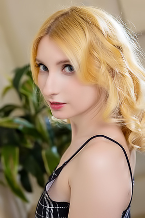 Minnie Lighter Squeezing Her Gorgeous Breasts Sensuously