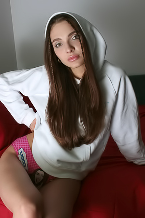 Gorgeous Brunette Santa Taking Off Her Sports Bra For A Lingering Look At Her Lovely Breasts
