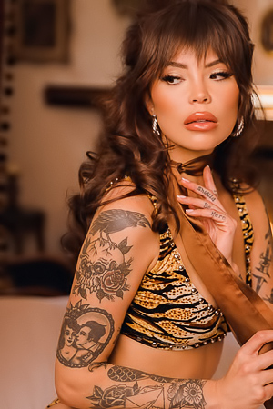 Emma Jade Takes Control With Red Dress And Tattoos