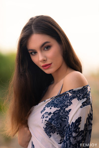 Liz Ocean Bares It All On A Sunlit Balcony With Bold Poses And Seductive Glances For Your Pleasure