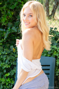 Bella Spark Baring Her Sexy Ass And The Neat Bush That Crowns Her Pouting Pussy