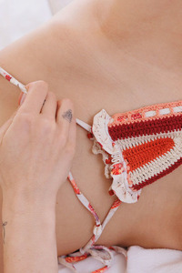 Carmen Vega Lounges On The Bed In A Skimpy Crocheted Bikini