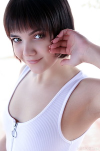 Chanel Fenn In A Tight Bodysuit That Accentuates Her Slender Body And Long Legs