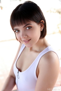 Chanel Fenn In A Tight Bodysuit That Accentuates Her Slender Body And Long Legs