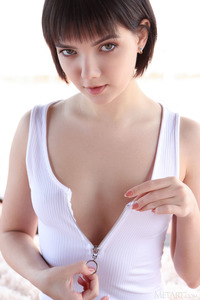 Chanel Fenn In A Tight Bodysuit That Accentuates Her Slender Body And Long Legs