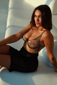 IngieQ Cute Brunette With A Striking Lion Tattoo On Her Arm