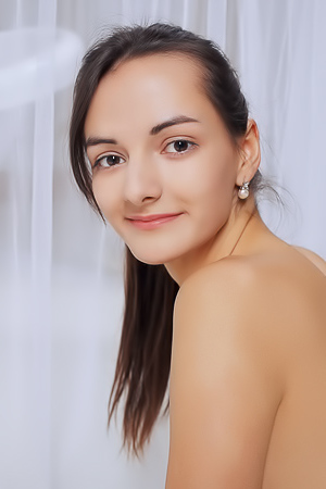 Sexy brunette proves she wears no lingerie under dress