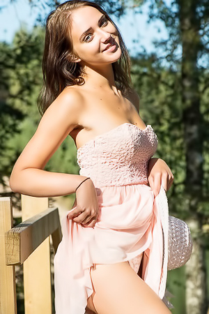 Amazing brunette is happy to get naked