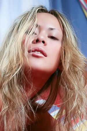 Quiana Tan teases by showing her perfect pussy on the couch while fingering it