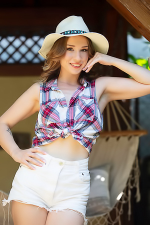 Alice Klay Gives Her Luscious Ass Cheeks An Amorous Squeeze