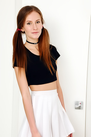 Alisa Revealing Her Lovely Small Breasts With Flirty Smile