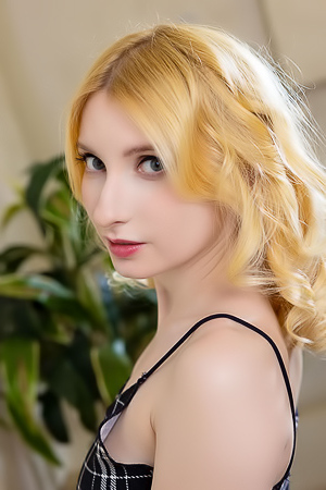 Minnie Lighter Squeezing Her Gorgeous Breasts And Smiles Seductively