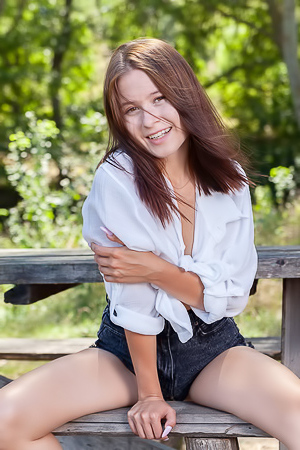 Skye Bloom Perching On A Picnic Table In The Park