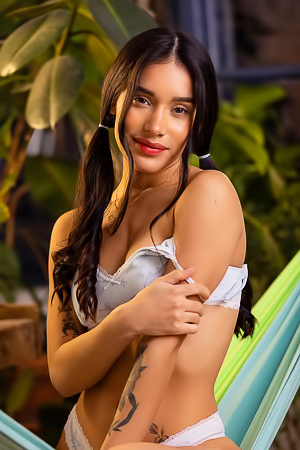Carolina Guerrero | Dark-Haired Nude Posing On Hammock