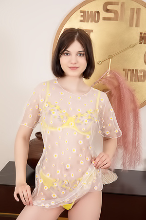 Sara Celeste Bending Over To Show How Her Thong Panties Nestle Between Her Perfect Buns