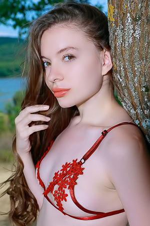 Dariana Caresses Her Lovely Breasts And Peachy Bottom