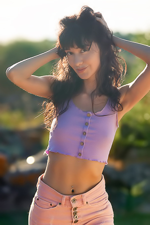 Violet Amrita Free-spirited American Beauty Reclines Naked On The Sun-warmed Rocks