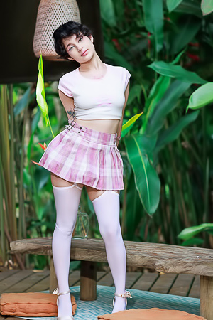 Dakota Jhons Entices In White Top And Plaid Skirt Outdoors Posing Seductively With High Heels On